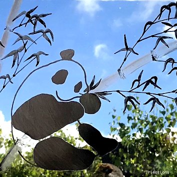 Panda and bamboos asian stained glass window. Stained glas class. Paris, Versailles, France.