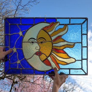 Moon and sun stained glass window copper foil technique. Stained glas class. Paris, Versailles, France.